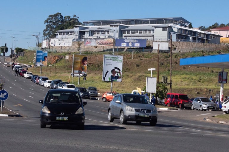 Cars queue up for petrol on a street in Mbabane, Eswatini, on 3 July 2021, as a tense calm returned to the country after days of widespread pro-democracy protests, -/AFP via Getty Images