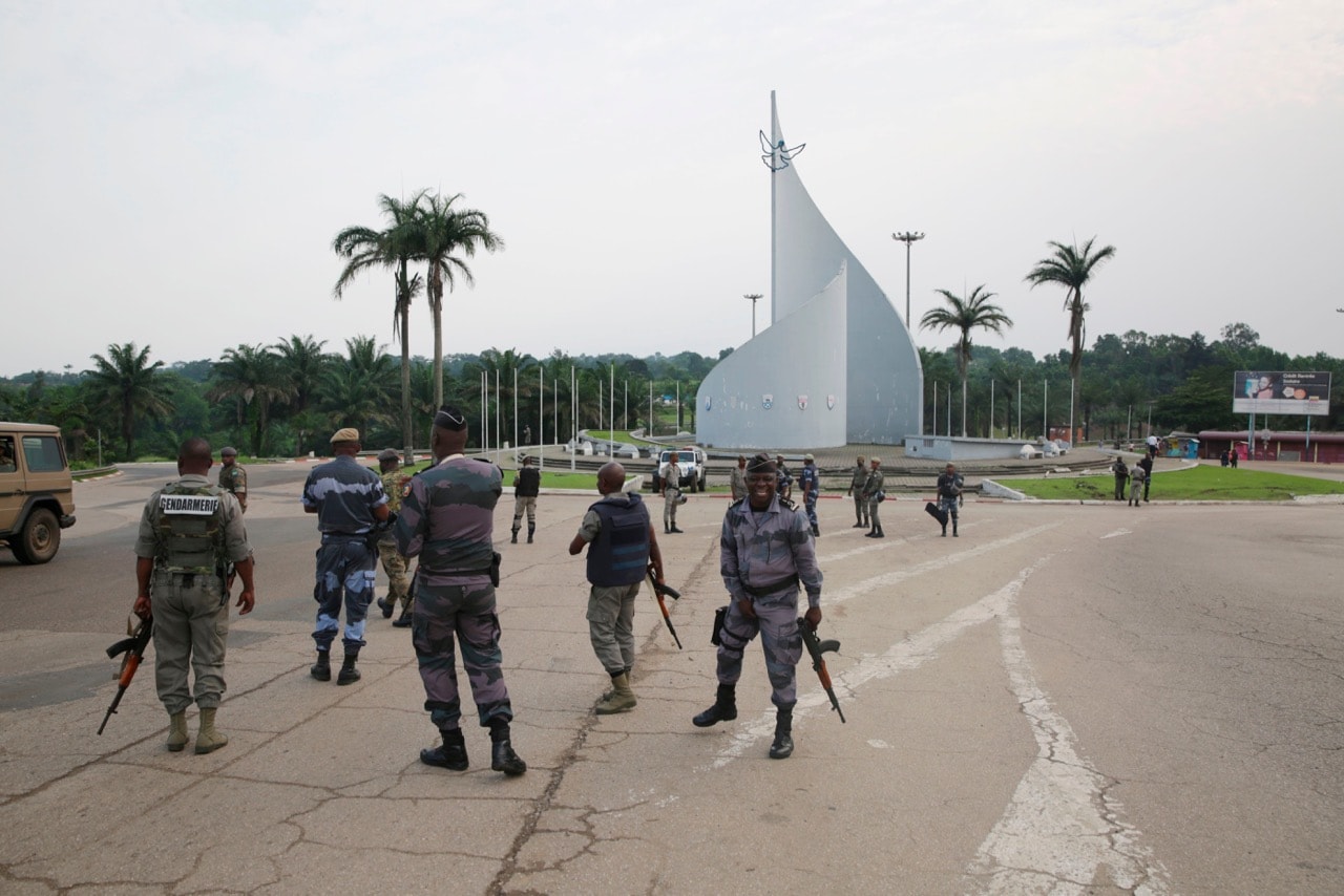 Gabonese gendarmes patrol on the Democracy square in Libreville on 7 January 2019 after a group of soldiers sought to take power in Gabon while the country's ailing president was abroad, STEVE JORDAN/AFP/Getty Images