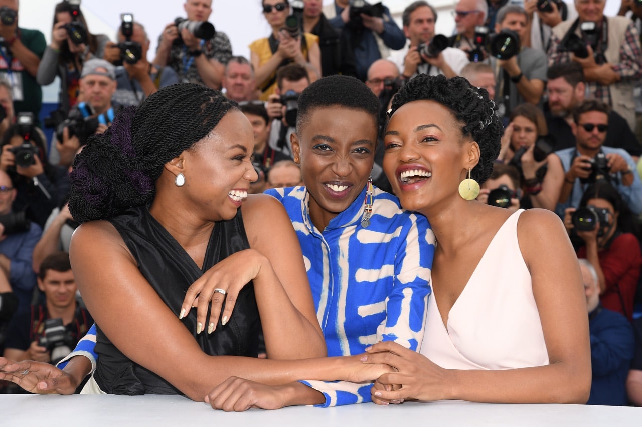 (L-R) Director Wanuri Kahiu, actresses Samantha Mugatsia and Sheila Munyiva attend the photocall for 'Rafiki' during the 71st annual Cannes Film Festival in Cannes, France, 9 May 2018, Pascal Le Segretain/Getty Images