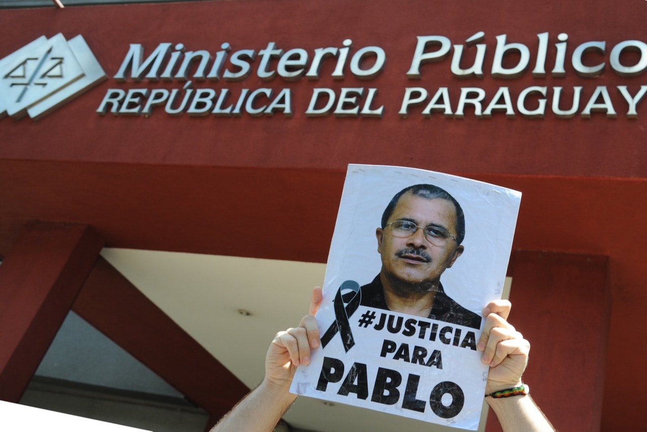 Paraguayan journalists call for the extradition from Brazil of a suspect in the murder of their colleague Pablo Medina, in Asunción, 6 March 2015, NORBERTO DUARTE/AFP/Getty Images