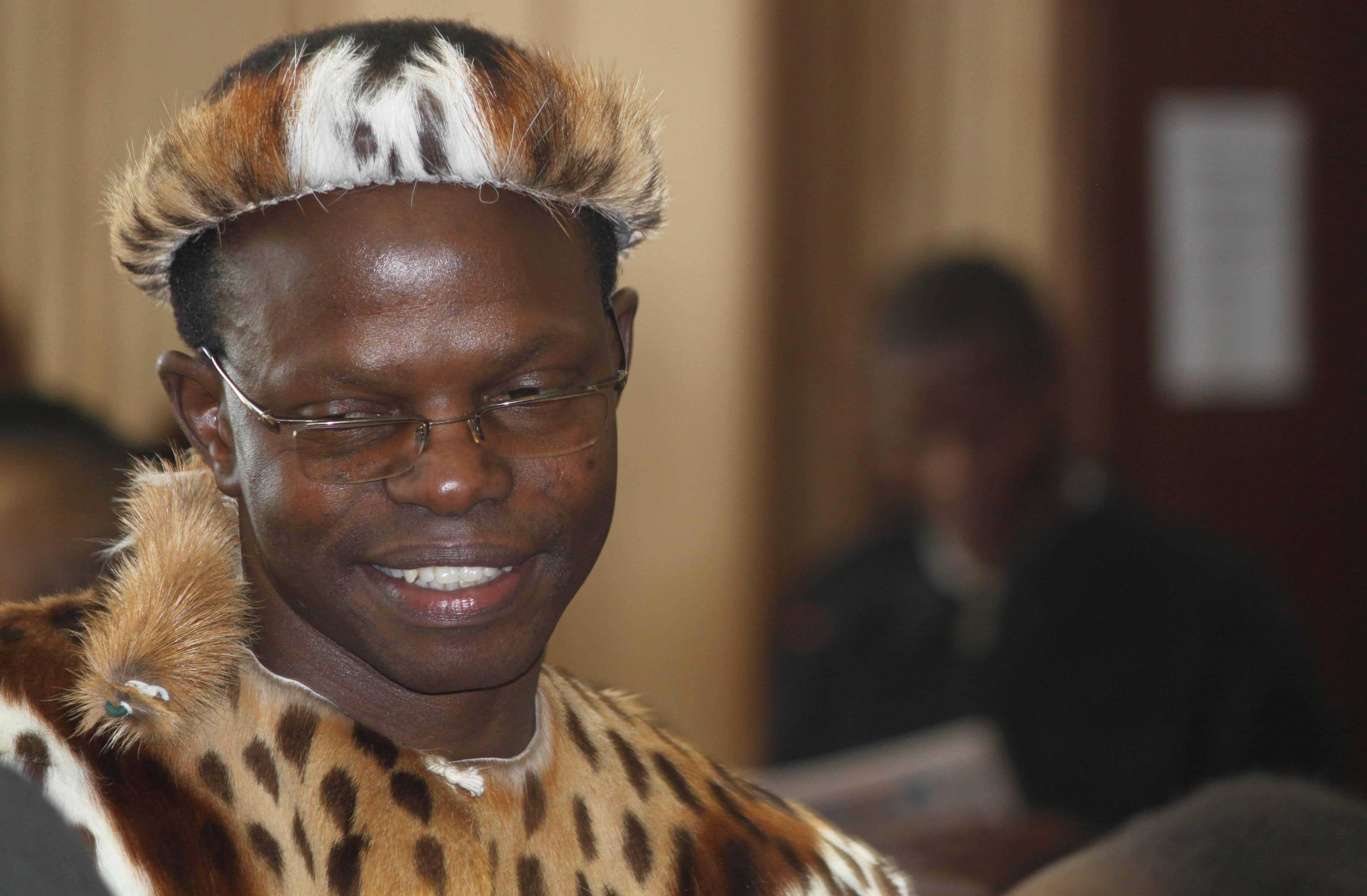 In this photo taken Wednesday, June 4, 2014, lawyer Thulani Maseko, appears in court in the traditional animal skin garb of a Zulu warrior, in Mbabane, Swaziland. , AP Photo/Nkosingiphile Myeni-The Nation Magazine