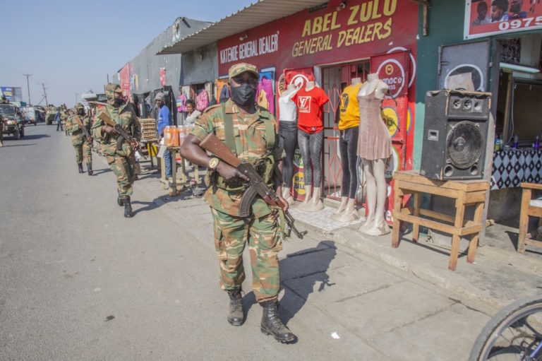 Soldiers patrol the Chawama Compound in Lusaka, Zambia, on 3 August 2021, after the president ordered the army to help police curb political violence that has characterised the run-up to the general election, SALIM DAWOOD/AFP via Getty Images
