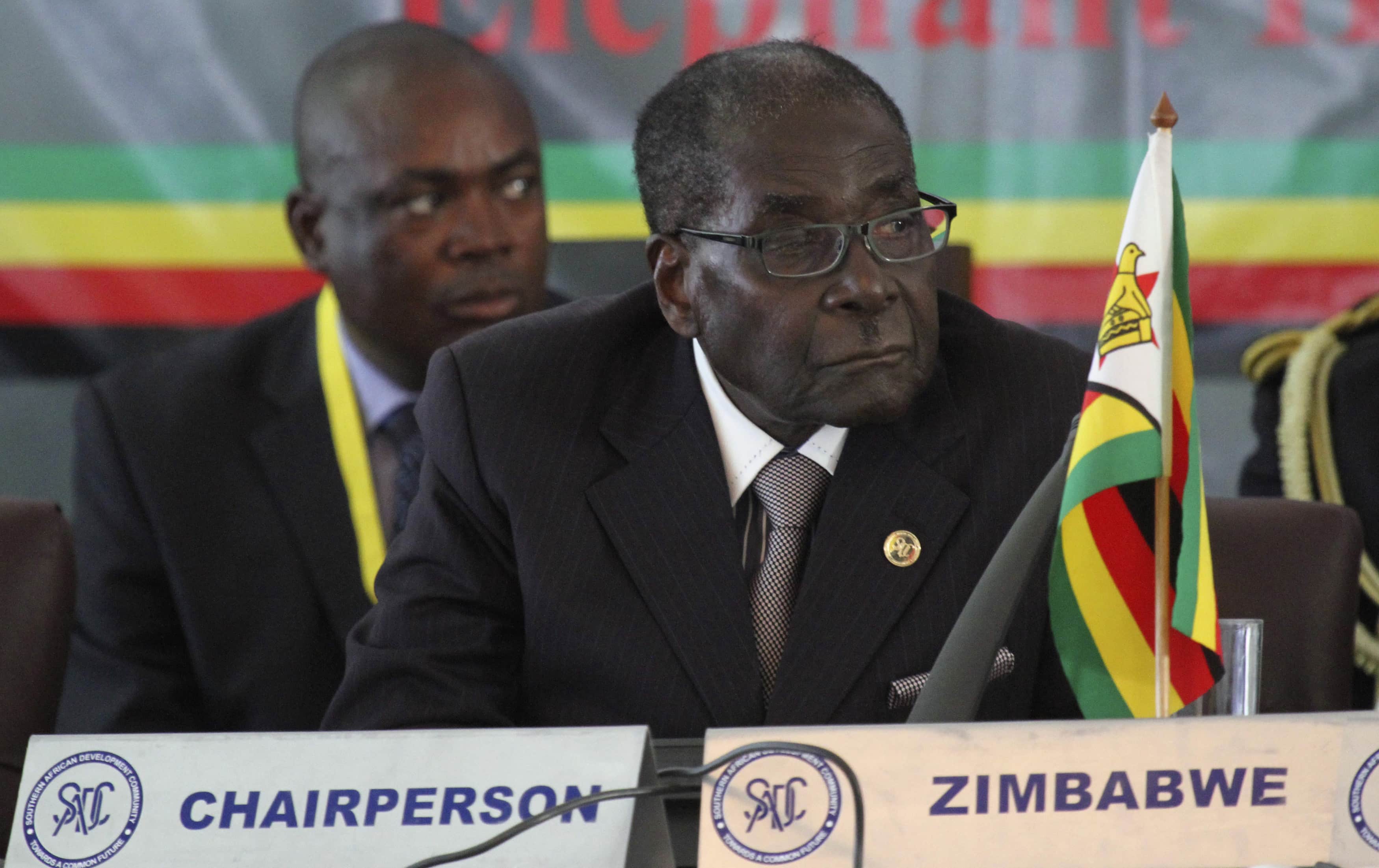 Zimbabwe's President Robert Mugabe listens to speakers at the 34th Southern African Development Conference (SADC) summit in Victoria Falls, 17 August 2014, REUTERS/Philimon Bulawayo